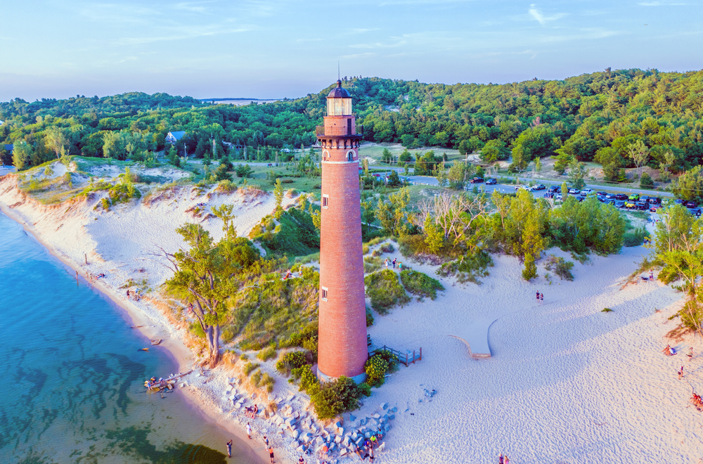 An aerial view of Silver Lake beach with the lighthouse