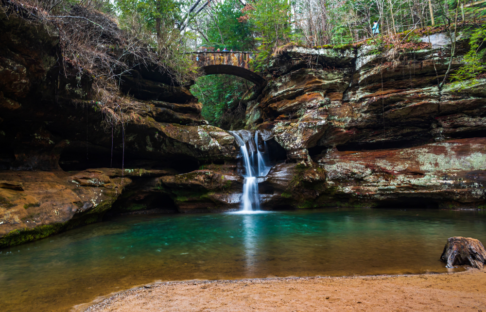 A beautiful waterfall in a article about things to do in Hocking Hills