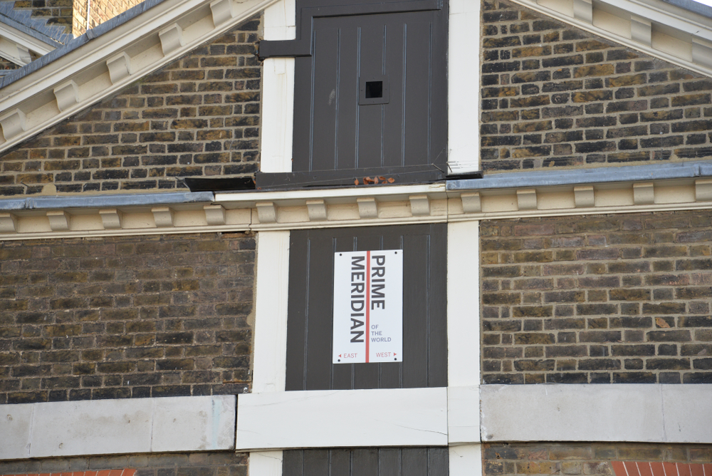 board showing prime meridian line things to do in greenwich