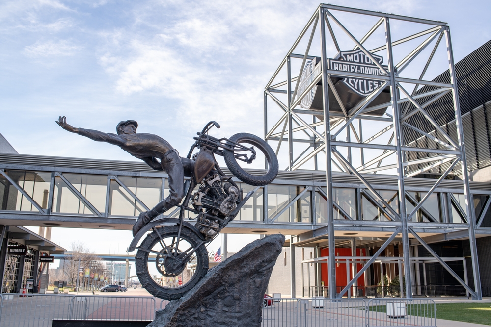 statue of a man on a bike in harley davidson museum attractions in wisconsin