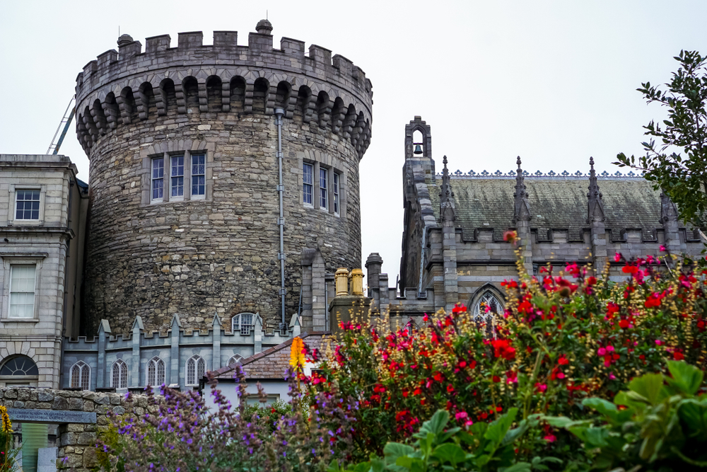 Dublin castle with flowers in front 