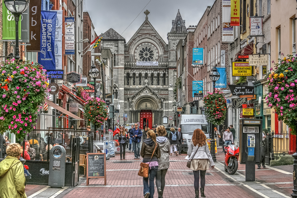 Shoppers and tourists at the famous Grafton Street Mall. The article is about 2 days in Dublin  itinerary