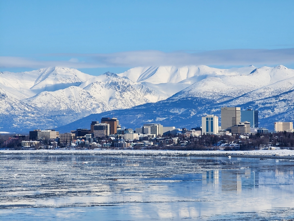 town surrounded by snowy mountains towns in alaska
