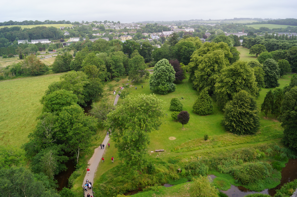 aerial view of a garden surrounded by city kiss the blarney stone