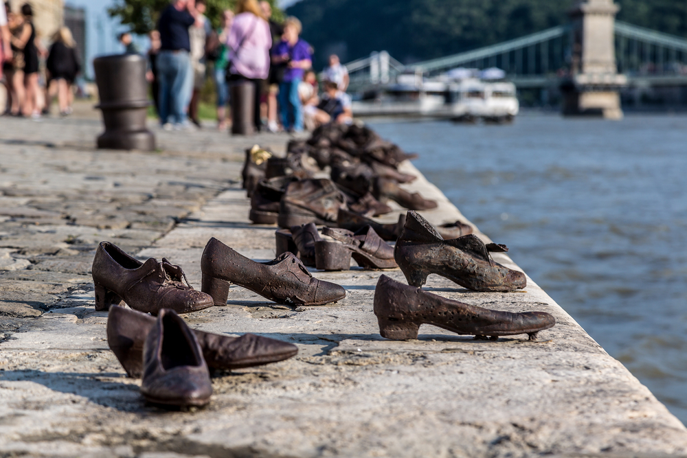 shoes on the banks of a river