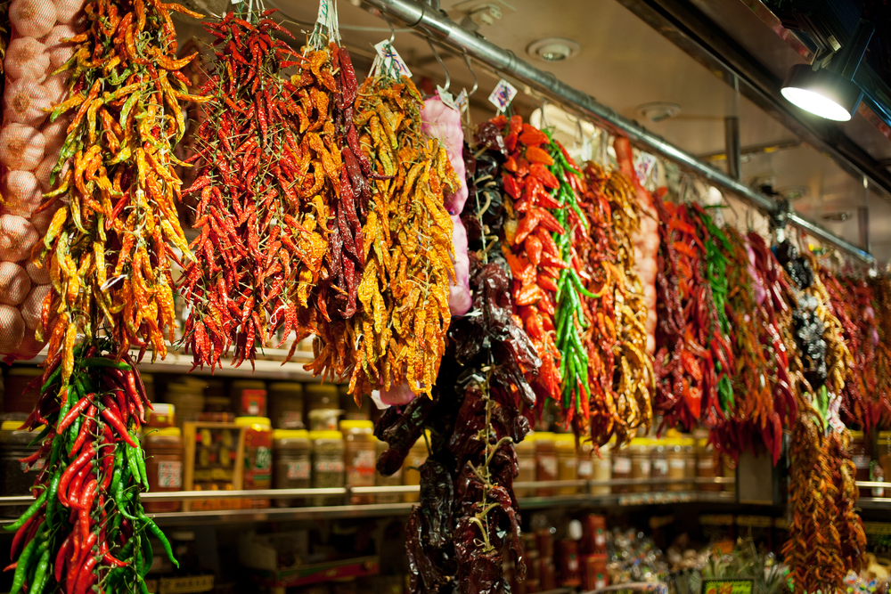 spices hanging in a market