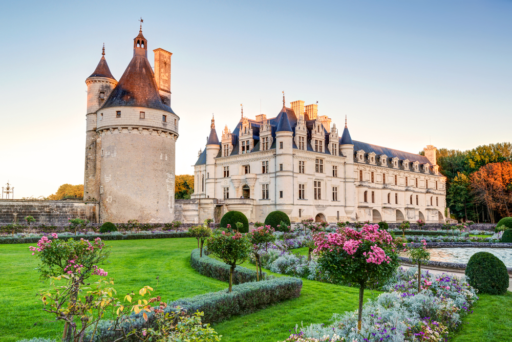 castle at sunset surrounded by gardens best day trips from paris