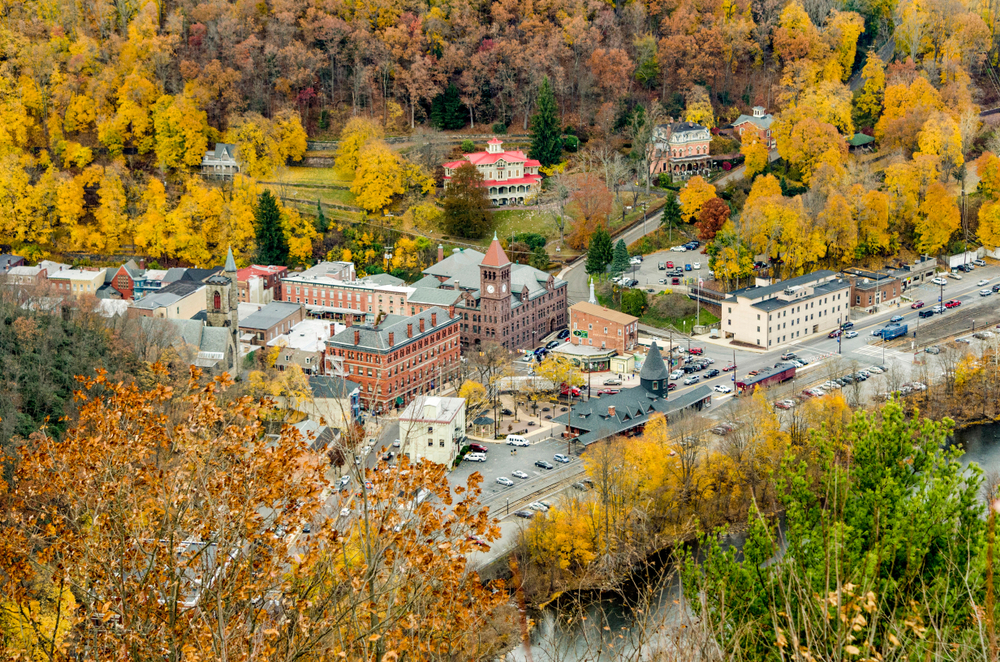 close up of the aerial view of a town surrounded by fall trees towns in the pocono mountains 