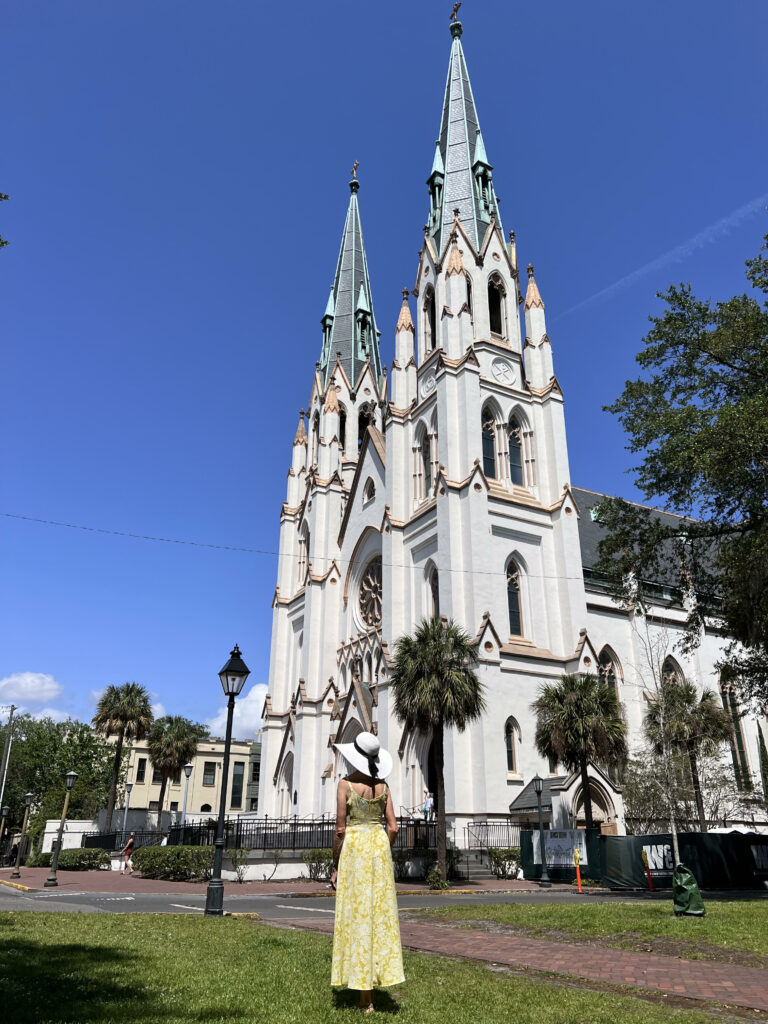 woman standing in front of a church