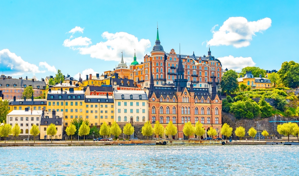 colorful houses in front of river summer in europe