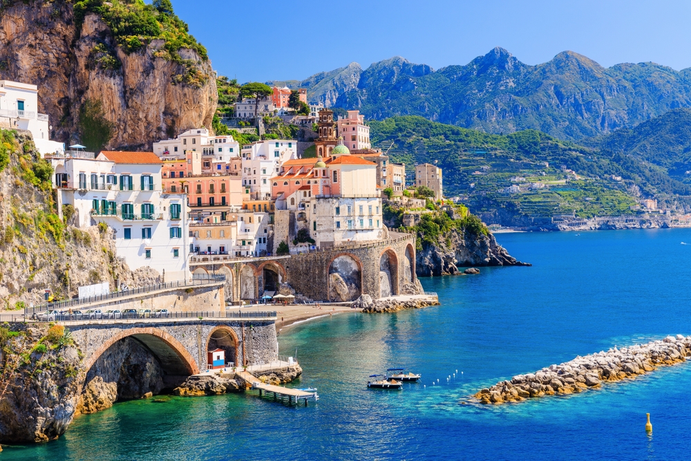 coastal city view with cliffs and mountains beside spring in europe