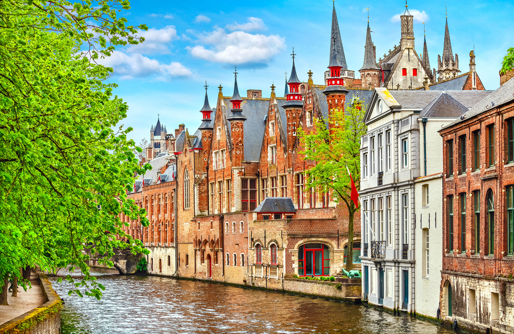 medieval town with colorful buildings beside river