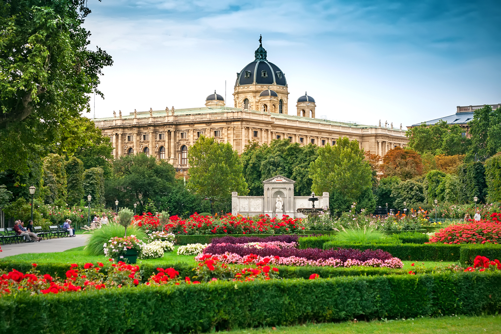 building with dome and garden in the front