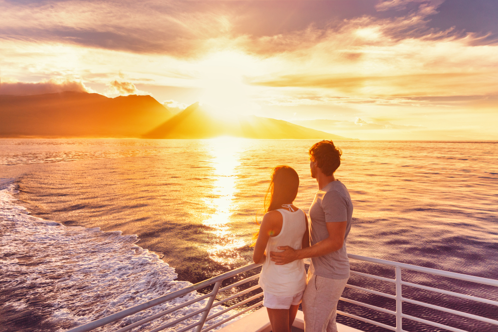 couple on a cruise watching the sunset mediterranean cruise packing list