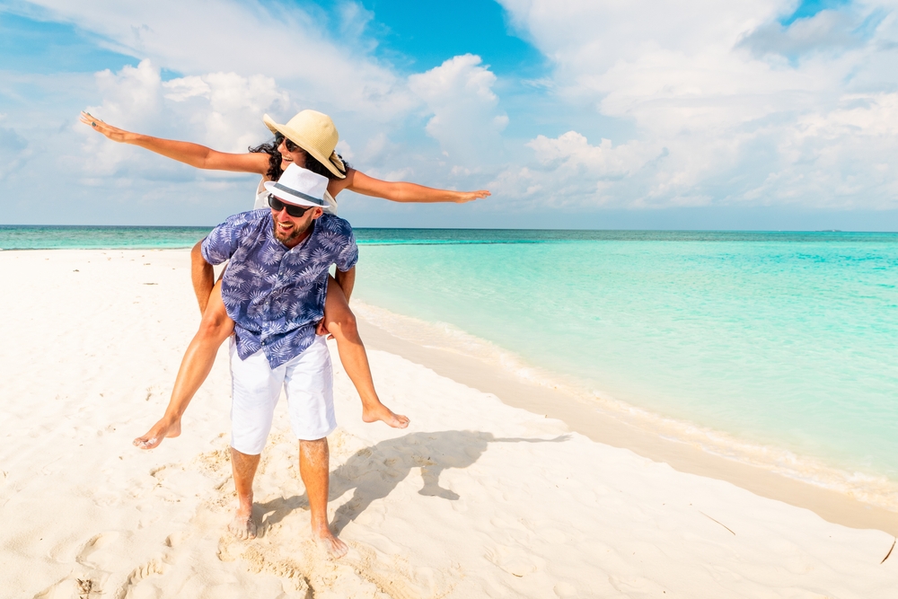 a couple enjoying on the beach