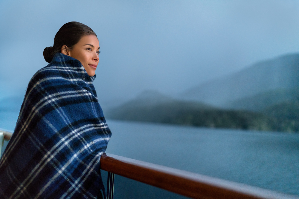 woman wearing a shawl onboard a cruise