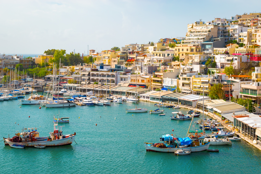 view of a port with lots of ships and boats
