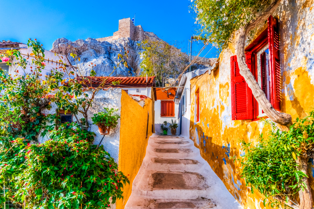 colorful buildings on a street tours in athens