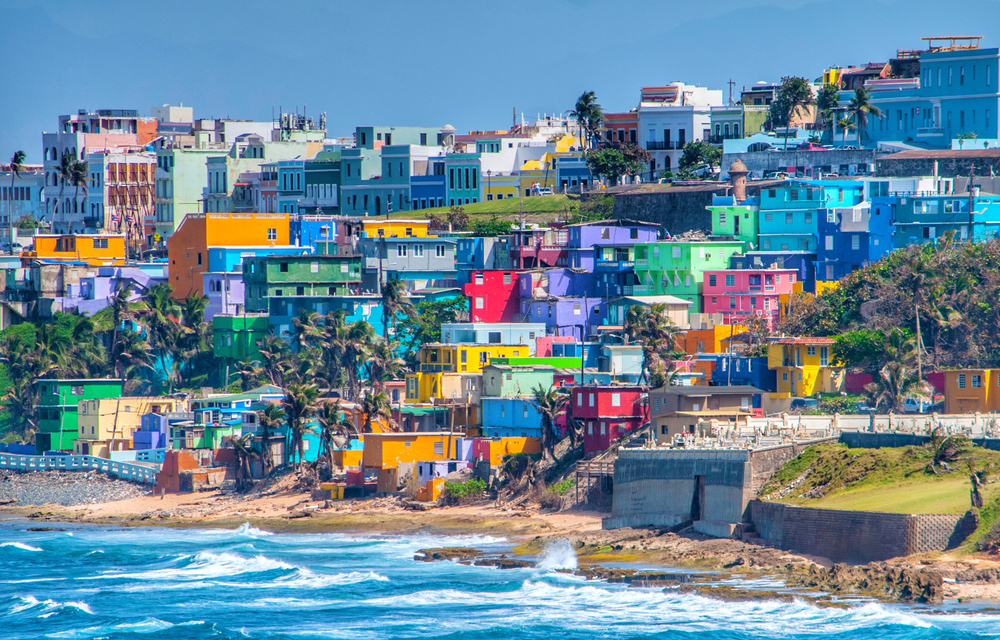 colorful houses on the hilldside warm weather getaways