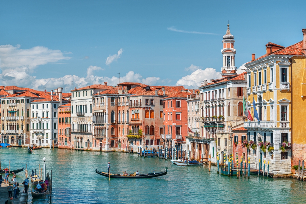 view of colorful buildings with boats