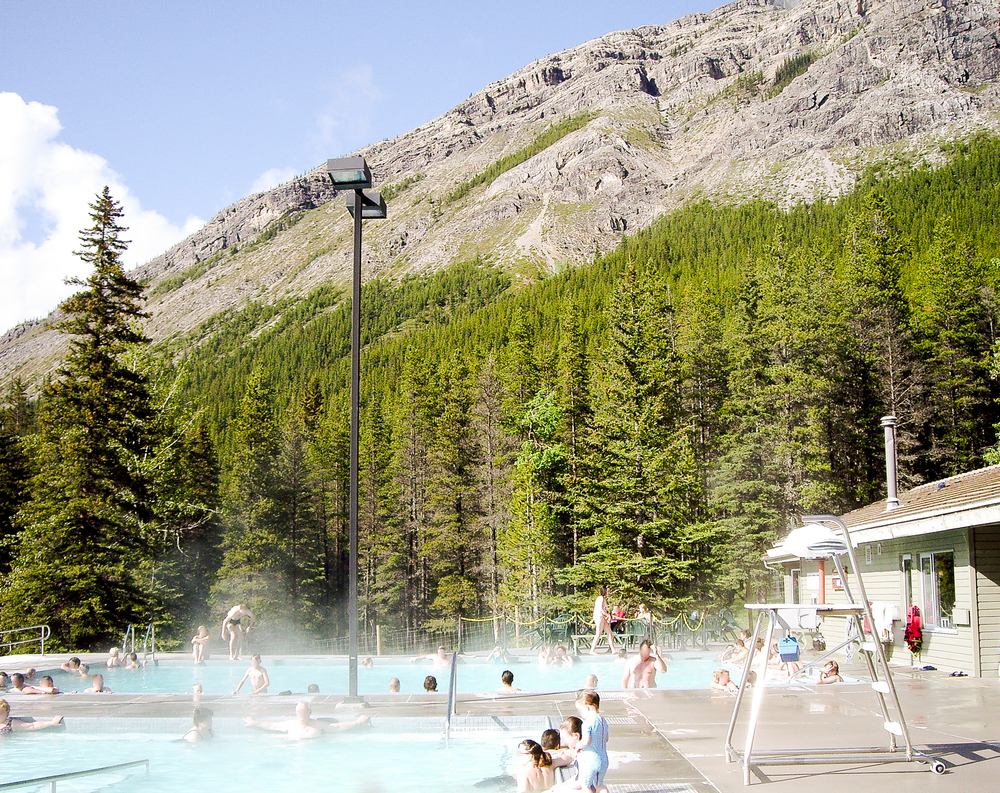 people enjoying a hot spring things to do in jasper