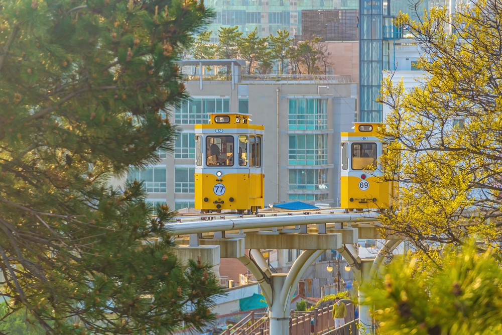 yellow colored sky capsules in the city Haeundae blueline park