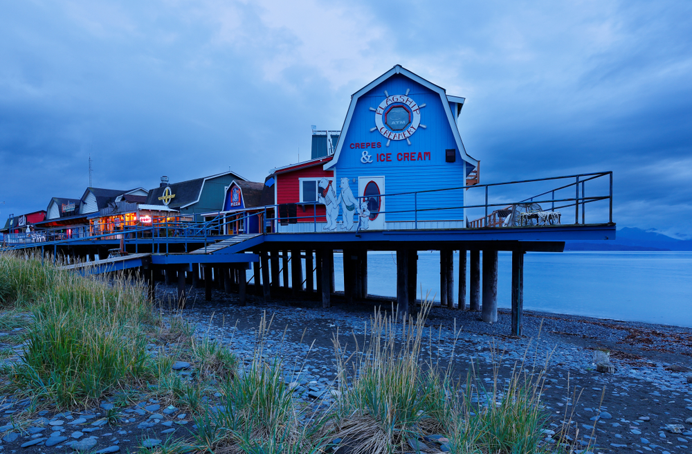 Homer Alaska shops up on stilts cloudy sky at sunset.
things to do in Homer Alaska