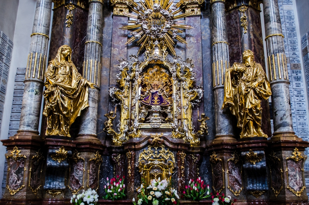 Intricate, golden display with the Infant Jesus of Prague.