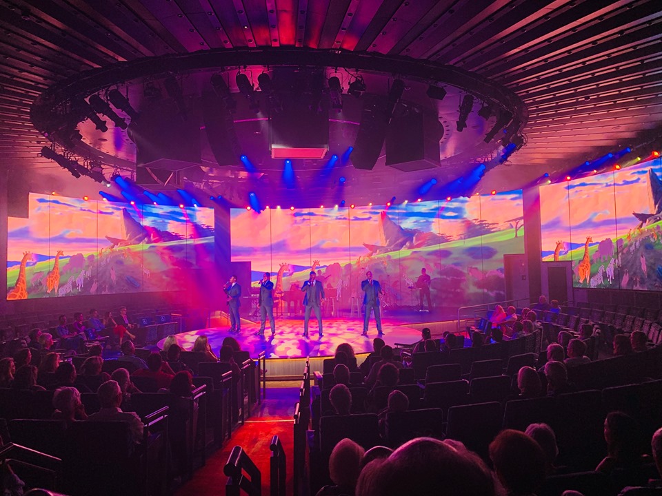 Holland America Mediterranean Cruise Vox Fortura performing on an brilliantly lighted stage