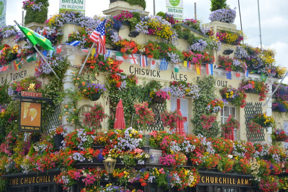 The flower adorned Churchill Arms, one of the hidden gems in London.