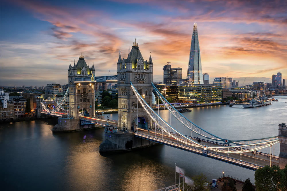 Sunset over the Tower Bridge and river with the Shard in the background.