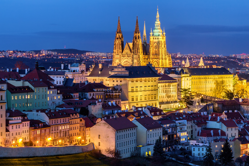 Prague Castle Complex illuminated at night. So much to do there on your one day in Prague