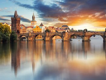 When traveling to Prague make sure to see a sinset over the Vltava River
