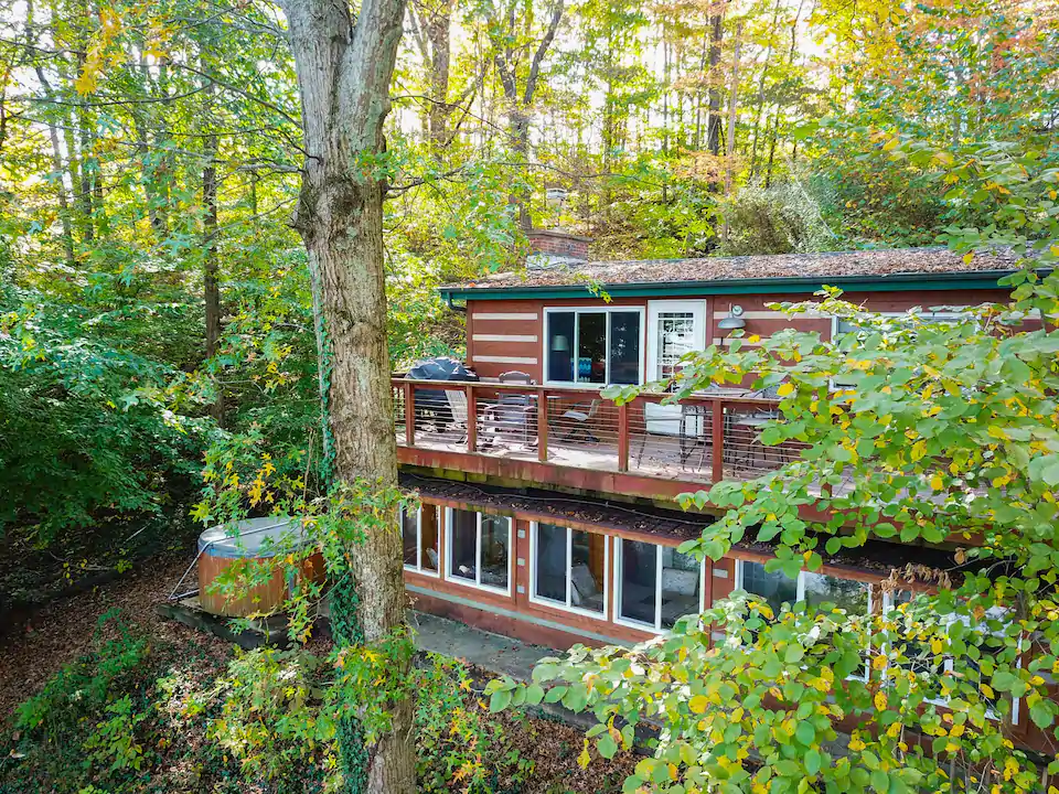 Indiana cabin surrounded by autumn trees