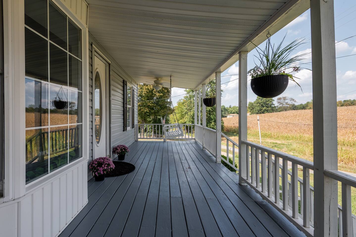 Expansive porch of the King's Farmhouse in Indiana 