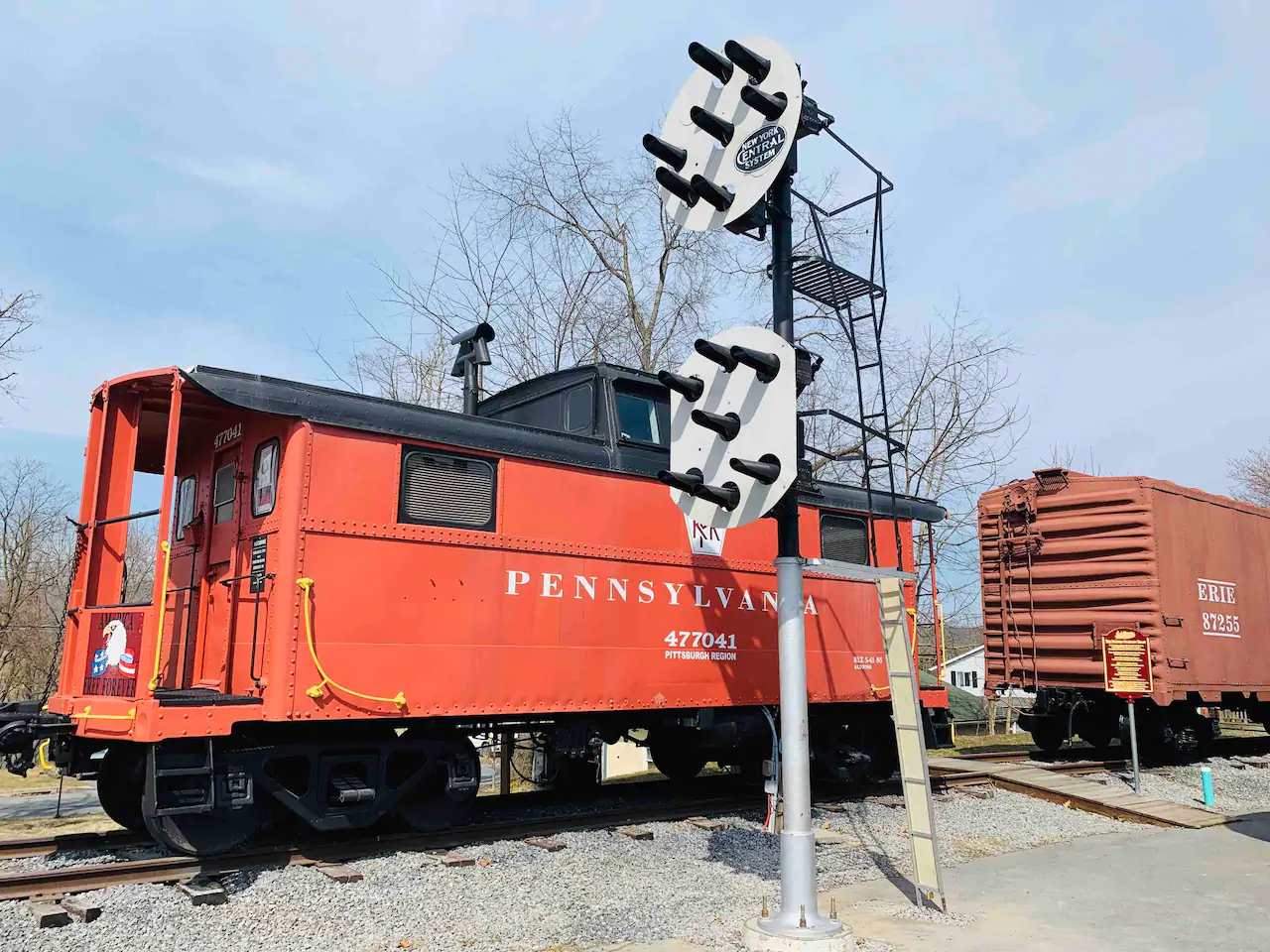 Historic red caboose at train station waiting for overnight guests