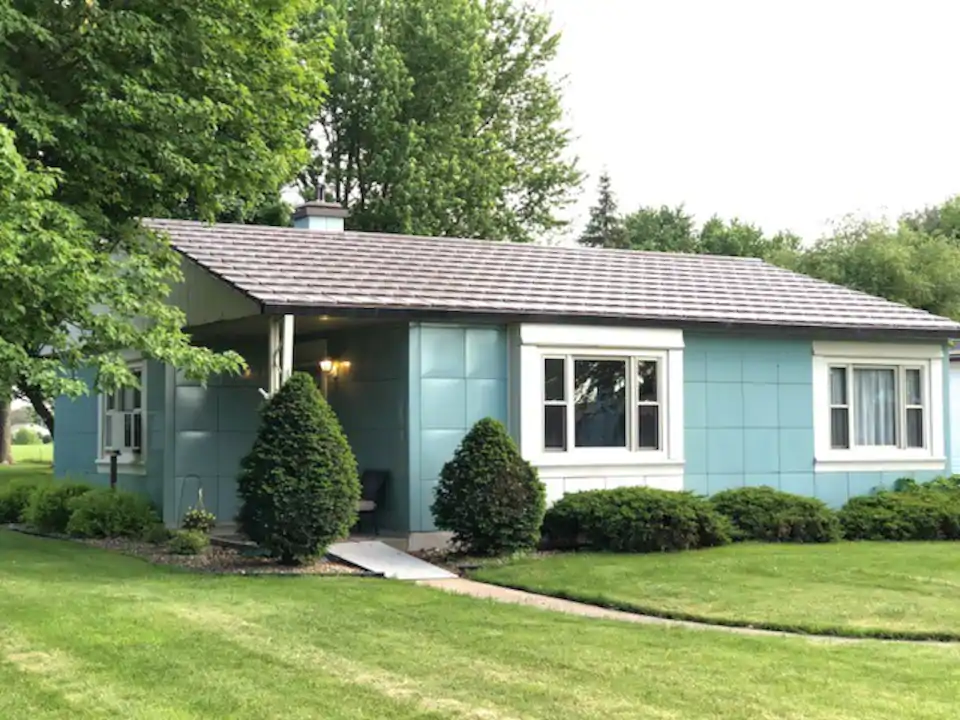 Cute retru house with blue lustron outside finish, and nice landscaping. This is one of the best Airbnbs in Illinois. 