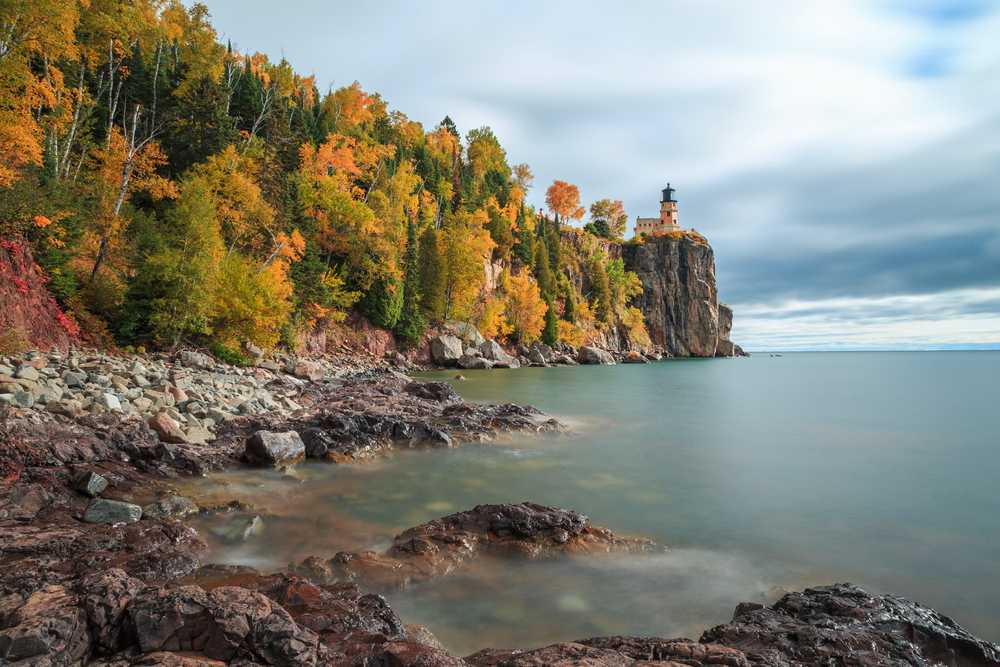 Autumnal photo of lighthouse near northern Minnesota cabin rentals on the shores of Lake Superior.