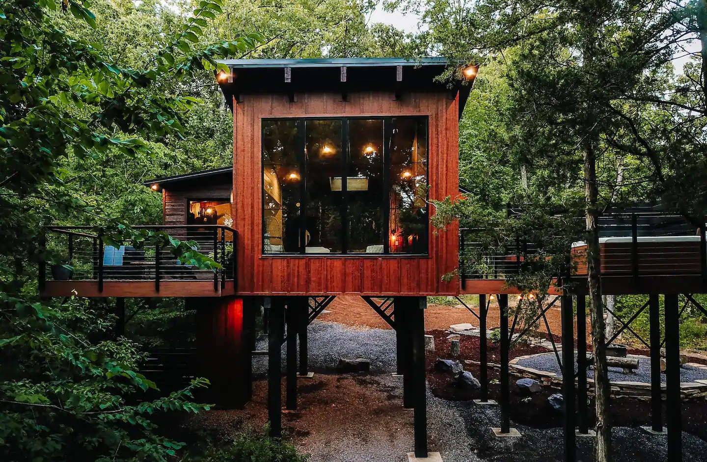 Epic Tree loft with floor to ceiling windows to bring in the view is the best Missouri Airbnb