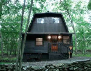 large uniquely shaped black cabin