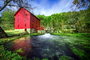 red mill on riverway national parks in the Midwest