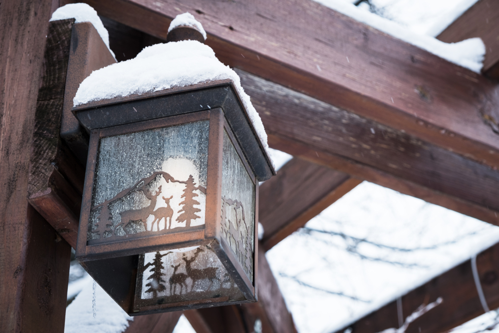 photo of a wooden beam of a Midwest cabin rental with a candle in it