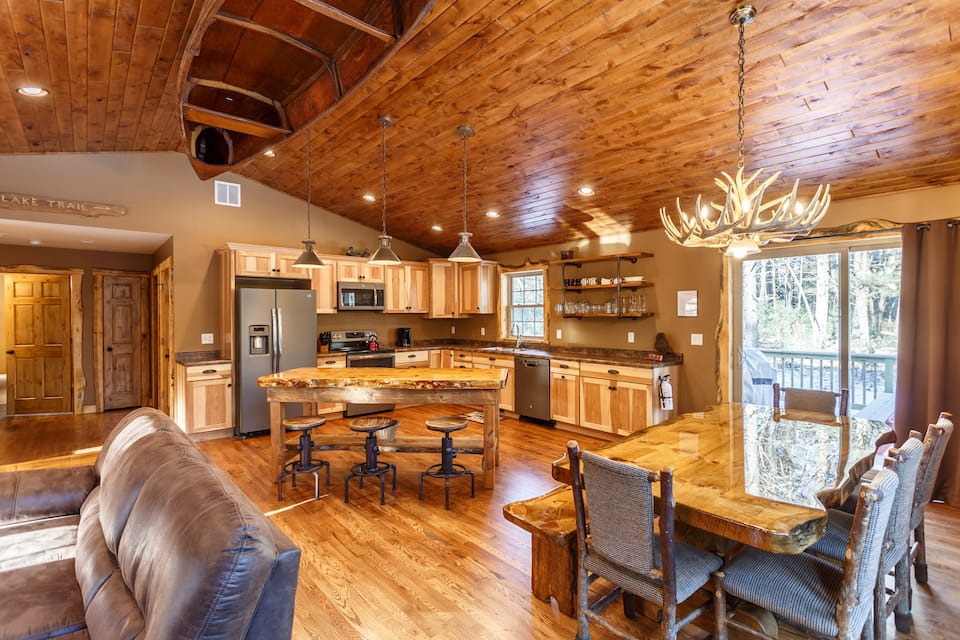 Spectacular cabin in Wisconsin with wooden ceiling and floors and top-of-the-line kitchen.