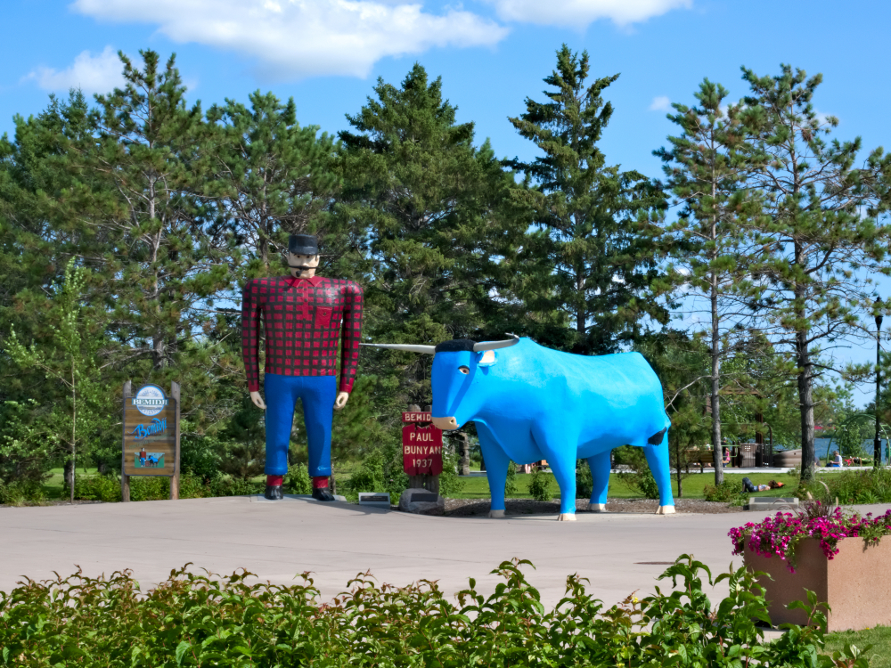 A large statue from the 1930s of Paul Bunyan and Babe the big blue ox