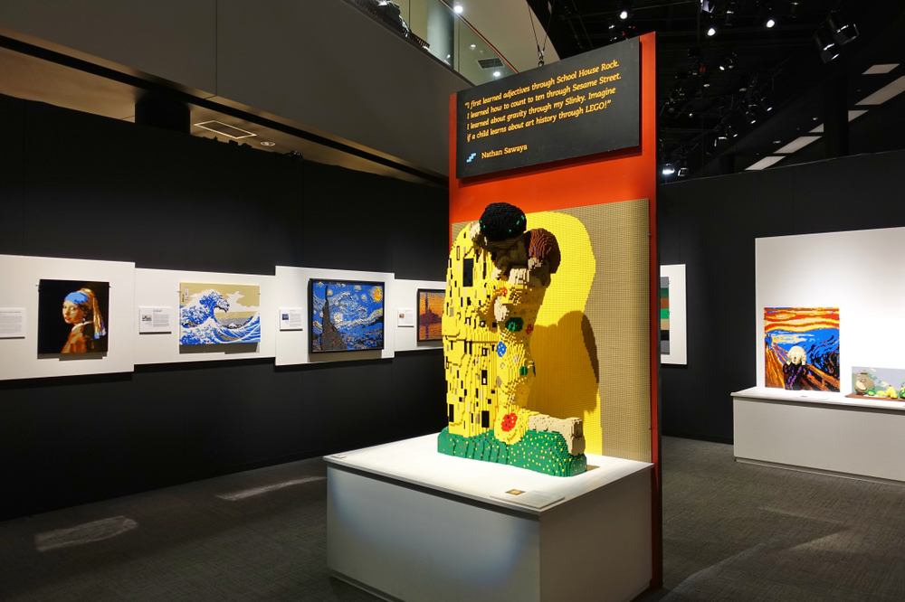 A view of the Carnegie Art Museum during a Lego exhibit. There are Lego sculptures made to look like classic paintings like 'Starry Night', 'Girl With A Pearl Earring', and 'The Kiss'. 