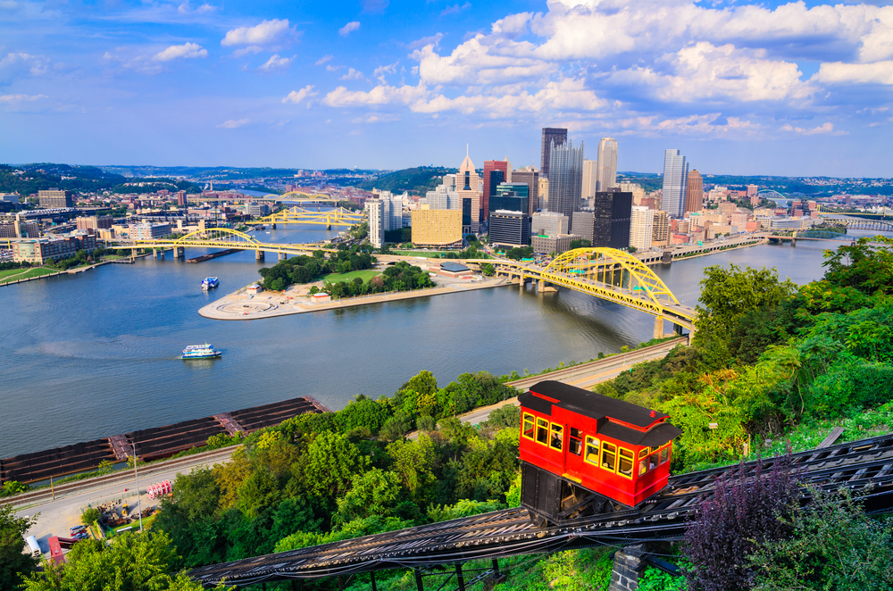 The view of the Pittsburgh skyline from the Monongahela Incline. It is a box car ride up the side of a mountain. You can see another box car going up the mountain in the picture as well. Its one of the best things to do in Pittsburgh.