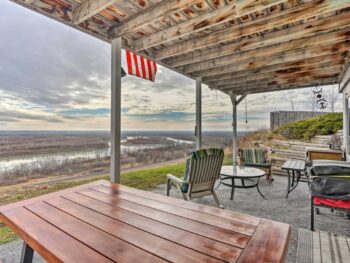 Patio view of ND prairie with covered patio roof and patio furniture. VRBO in North Dakota