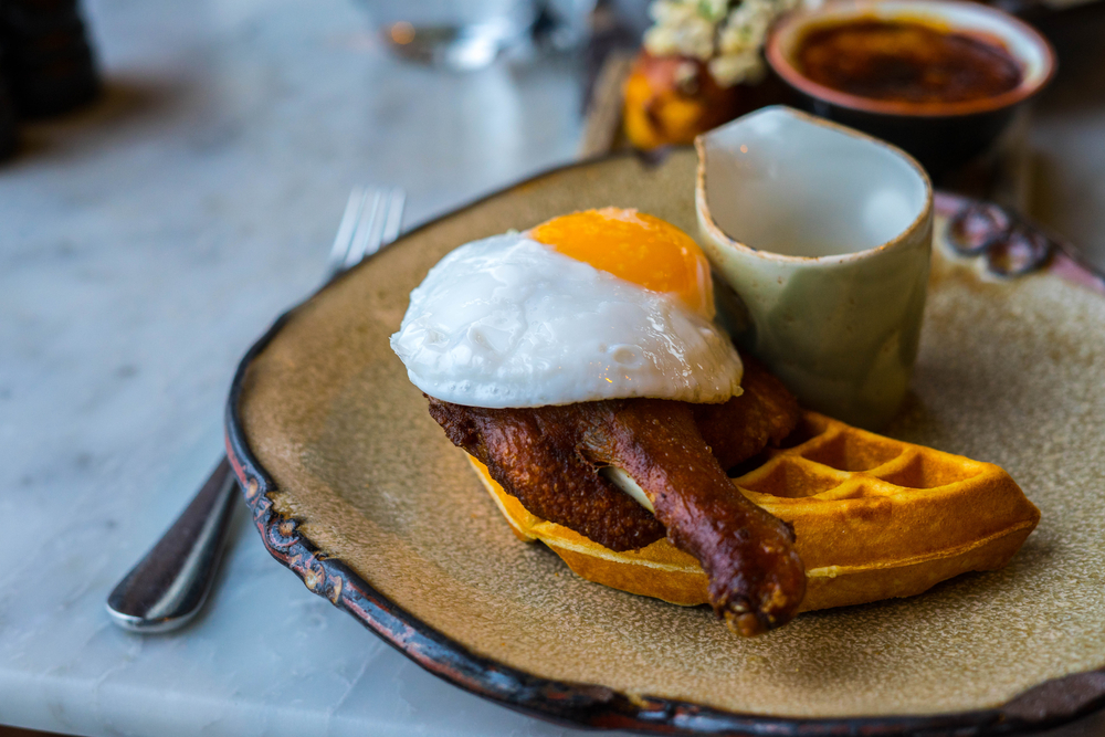 The Famous Duck and Waffle on a plate in the restaurant.  The article is about the best breakfast in London. 
