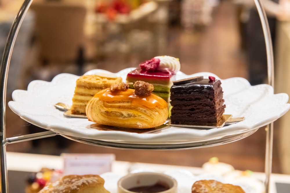 Close up of pastries on a cake stand. 