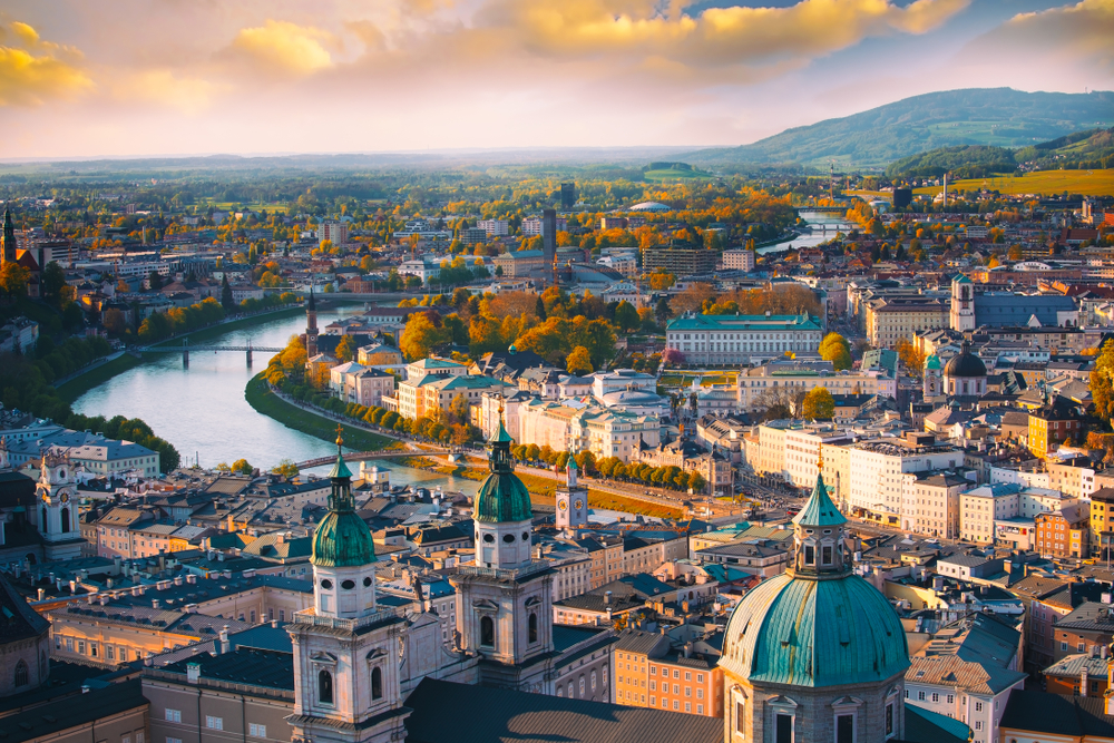 An aerial view of Vienna Austria with the Danube River running through it